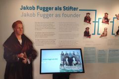 Details-mit-den-bis-heute-geltenden-Bedingungen-fuer-die-Aufnahme-der-Bewohner-in-die-Fuggerei-in-Augsburg-01